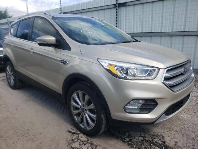 FORD ESCAPE TIT 2017 with VIN 1FMCU0J98HUE65401 - Photo from auction