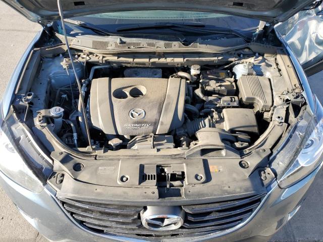 Photo 7 from auction – 2016 MAZDA CX-5 SPORT with VIN JM3KE2BY3G0890214