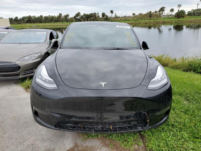 Photo 7 from auction – 2021 TESLA MODEL Y with VIN 5YJYGDEE9MF172920