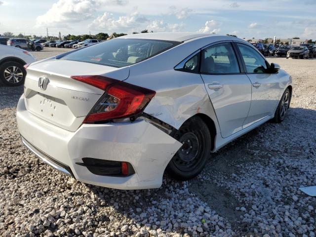 Photo 4 from auction – 2019 HONDA CIVIC LX with VIN 19XFC2F62KE012332