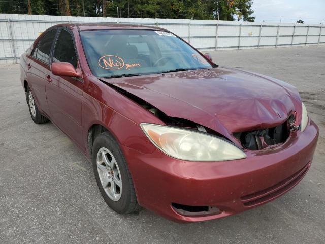 TOYOTA CAMRY LE 2004 with VIN JTDBE32K040260348 - Photo from auction