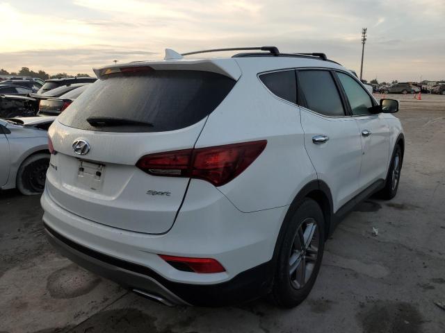 Photo 4 from auction – 2017 HYUNDAI SANTA FE S with VIN 5NMZU3LB3HH014903