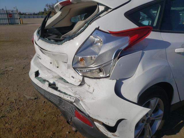 Photo 9 from auction – 2013 FORD FOCUS SE with VIN 1FADP3K23DL116980