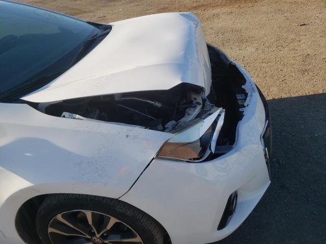 Photo 9 from auction – 2014 TOYOTA COROLLA L with VIN 5YFBURHE0EP117186