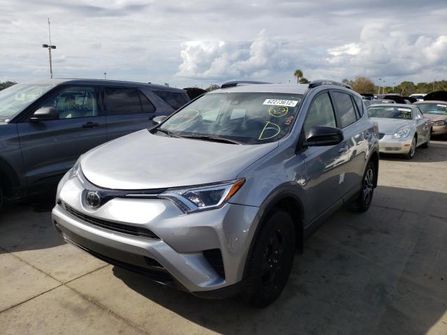 Photo 2 from auction – 2018 TOYOTA RAV4 LE with VIN JTMZFREV0JJ175861