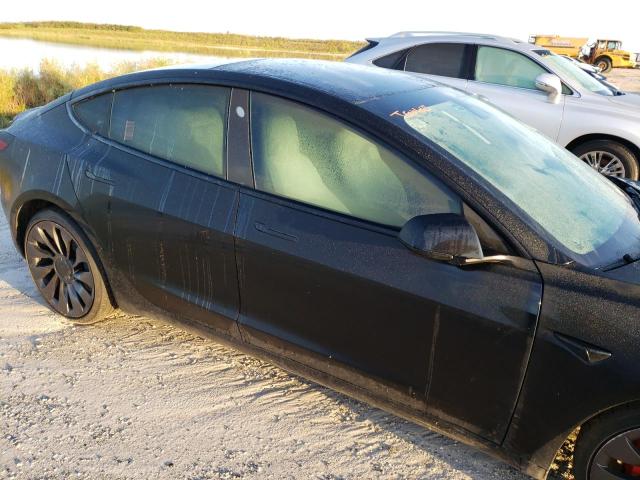 Photo 9 from auction – 2022 TESLA MODEL 3 with VIN 5YJ3E1EC8NF109368