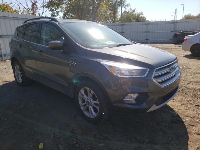 FORD ESCAPE SE 2018 with VIN 1FMCU9GD4JUA89799 - Photo from auction