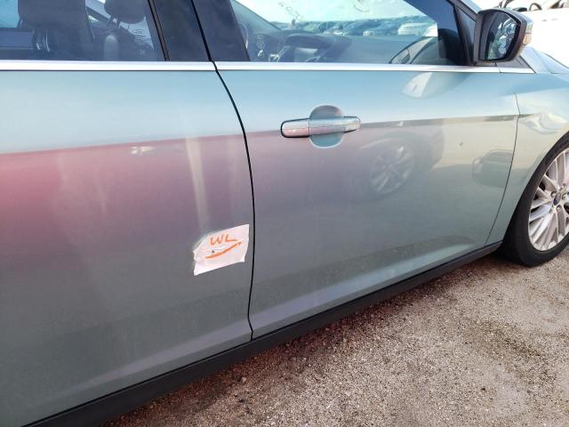 Photo 9 from auction – 2012 FORD FOCUS SEL with VIN 1FAHP3M2XCL360574