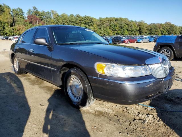 LINCOLN TOWN CAR E 2001 with VIN 1LNHM81W51Y717372 - Photo from auction