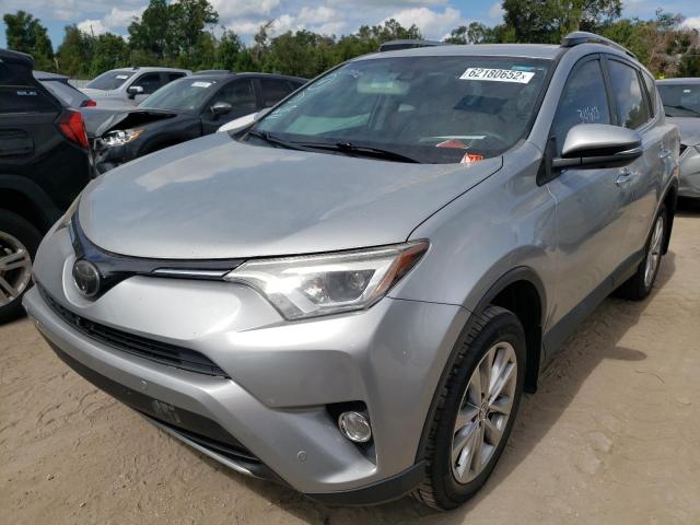 Photo 2 from auction – 2018 TOYOTA RAV4 LIMIT with VIN 2T3YFREV3JW474306