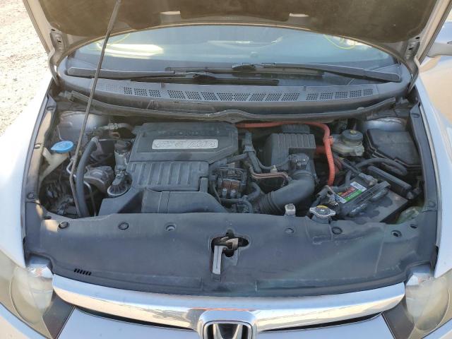 Photo 7 from auction – 2006 HONDA CIVIC HYBR with VIN JHMFA36256S014666