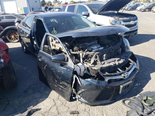 TOYOTA CAMRY LE 2017 with VIN 4T1BF1FKXHU451913 - Photo from auction