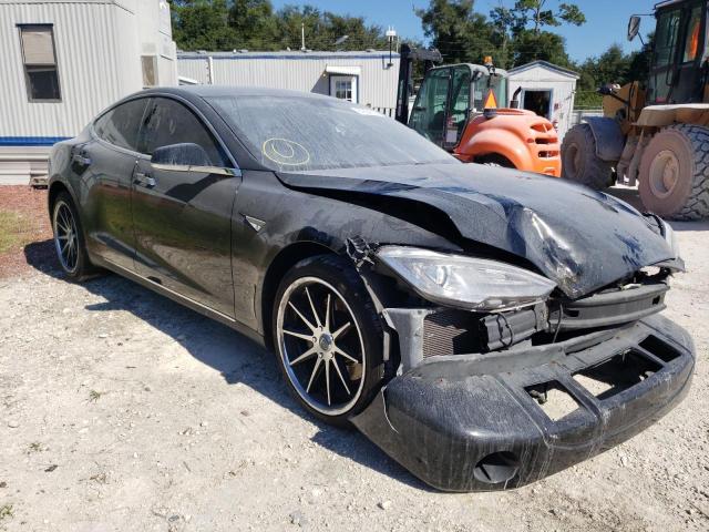 TESLA MODEL S 2014 with VIN 5YJSA1H17EFP30604 - Photo from auction