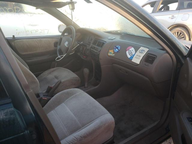 Photo 5 from auction – 1997 TOYOTA COROLLA DX with VIN 2T1BB02E3VC203599