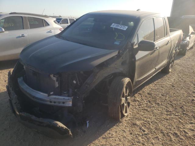 Photo 2 from auction – 2020 HONDA RIDGELINE with VIN 5FPYK3F89LB012379