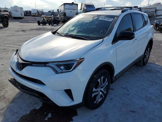Photo 2 from auction – 2017 TOYOTA RAV4 LE with VIN JTMBFREV9HD205952