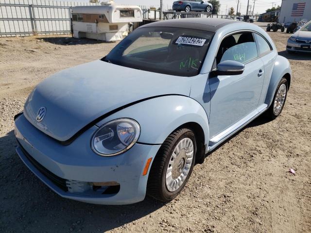 Photo 2 from auction – 2014 VOLKSWAGEN BEETLE with VIN 3VWJP7AT2EM604040