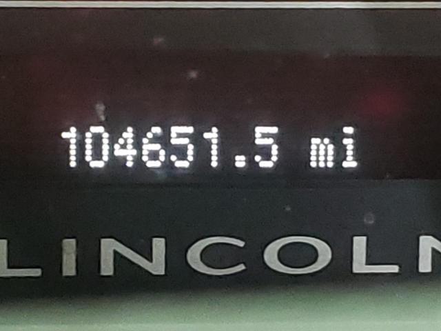 Photo 8 from auction – 2014 LINCOLN NAVIGATOR with VIN 5LMJJ3J52EEL05242
