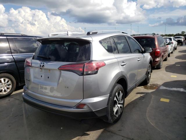 Photo 4 from auction – 2018 TOYOTA RAV4 LE with VIN JTMZFREV0JJ175861