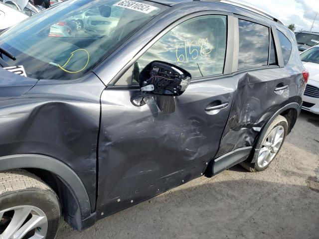 Photo 9 from auction – 2014 MAZDA CX-5 GT with VIN JM3KE2DY5E0344654