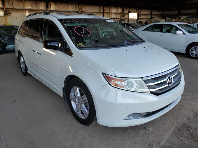 HONDA ODYSSEY TO 2012 with VIN 5FNRL5H90CB007552 - Photo from auction