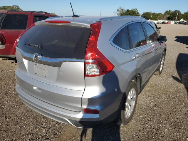 Photo 4 from auction – 2015 HONDA CR-V EXL with VIN 2HKRM3H75FH554290