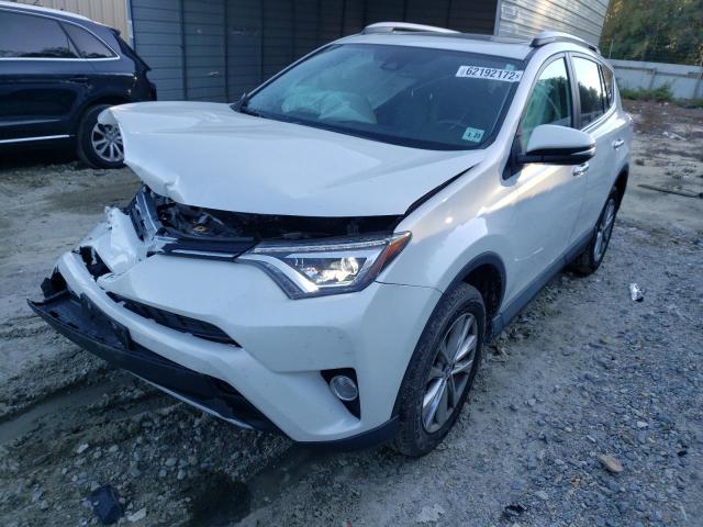 Photo 2 from auction – 2018 TOYOTA RAV4 LIMIT with VIN 2T3DFREV6JW715967