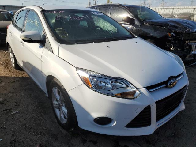 FORD FOCUS SE 2014 with VIN 1FADP3K20EL320573 - Photo from auction
