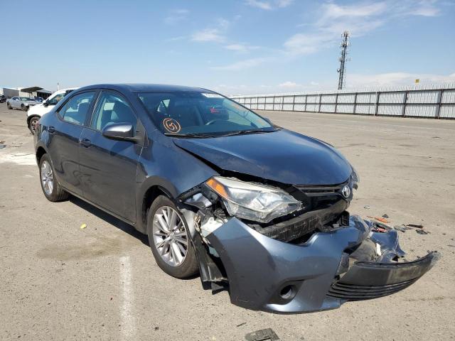 TOYOTA COROLLA L 2014 with VIN 5YFBURHE2EP091710 - Photo from auction