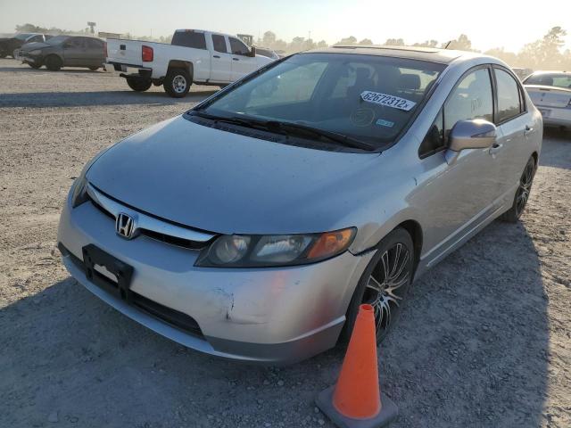 Photo 2 from auction – 2006 HONDA CIVIC HYBR with VIN JHMFA36256S014666