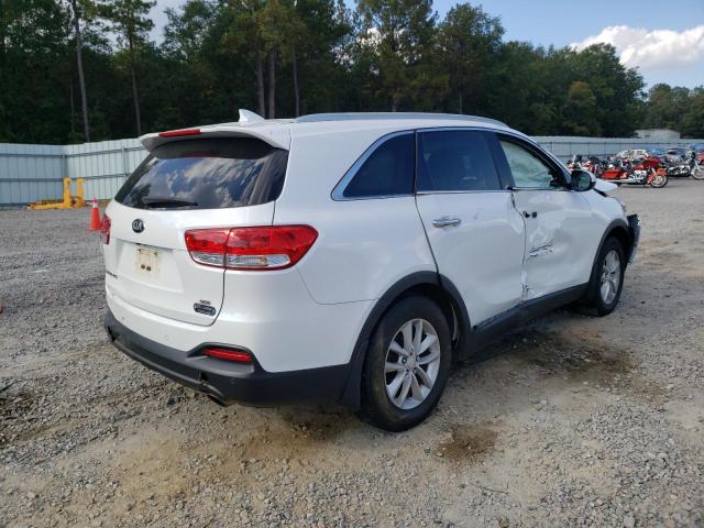 Photo 4 from auction – 2016 KIA SORENTO LX with VIN 5XYPG4A33GG055024