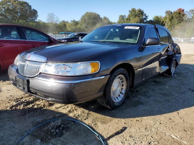 Photo 2 from auction – 2001 LINCOLN TOWN CAR E with VIN 1LNHM81W51Y717372