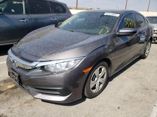 Photo 2 from auction – 2018 HONDA CIVIC LX with VIN 2HGFC2F58JH531932