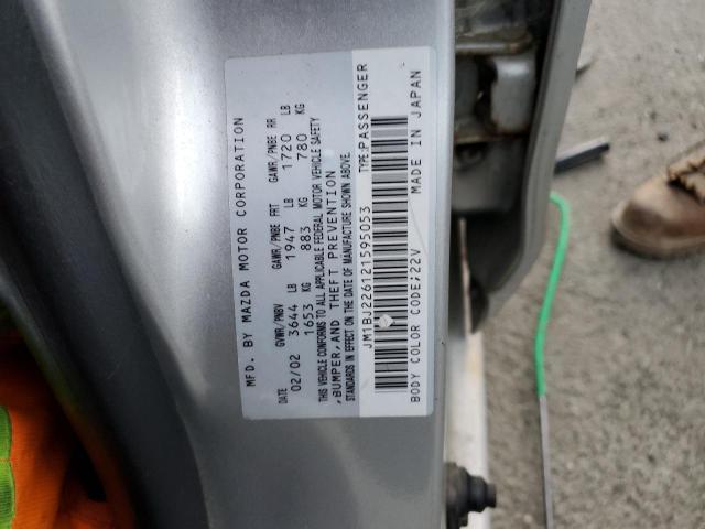 Photo 10 from auction – 2002 MAZDA PROTEGE DX with VIN JM1BJ226121595053
