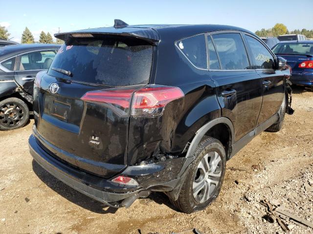 Photo 4 from auction – 2018 TOYOTA RAV4 LE with VIN 2T3BFREV5JW824461