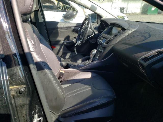 Photo 5 from auction – 2014 FORD FOCUS TITA with VIN 1FADP3N23EL377944