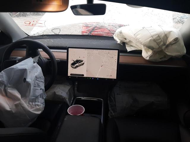 Photo 9 from auction – 2021 TESLA MODEL Y with VIN 5YJYGAEE4MF250440