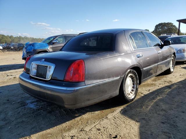 Photo 4 from auction – 2001 LINCOLN TOWN CAR E with VIN 1LNHM81W51Y717372