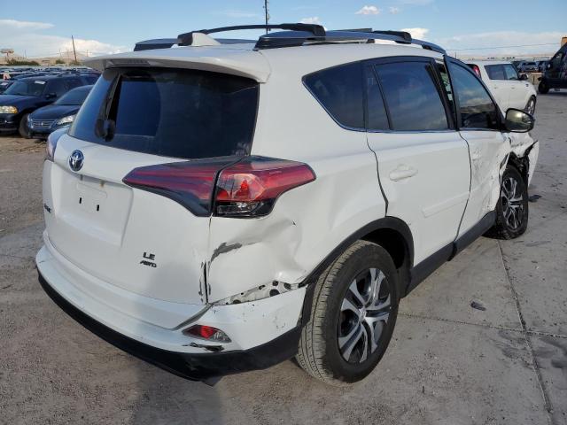 Photo 4 from auction – 2017 TOYOTA RAV4 LE with VIN JTMBFREV9HD205952