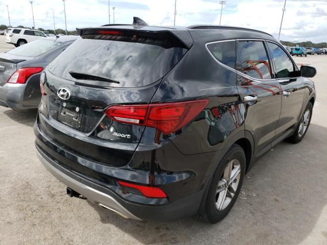 Photo 4 from auction – 2018 HYUNDAI SANTA FE S with VIN 5NMZU3LB5JH059301