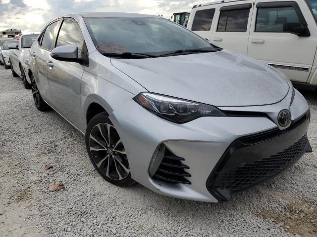 TOYOTA COROLLA L 2018 with VIN 5YFBURHE1JP830429 - Photo from auction