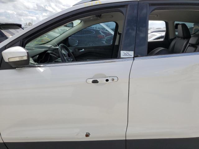 Photo 9 from auction – 2014 FORD ESCAPE TIT with VIN 1FMCU0J99EUB12662