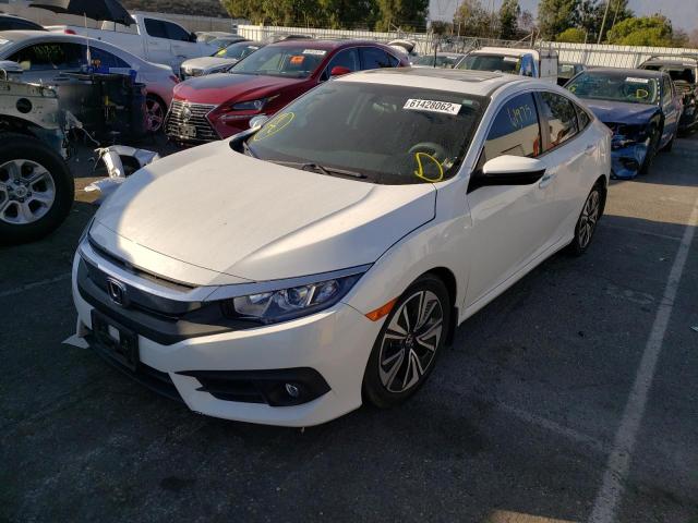Photo 2 from auction – 2016 HONDA CIVIC EX with VIN 2HGFC1F38GH648931