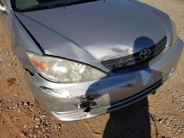 Photo 9 from auction – 2004 TOYOTA CAMRY LE with VIN 4T1BE32K14U852409
