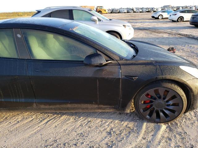 Photo 5 from auction – 2022 TESLA MODEL 3 with VIN 5YJ3E1EC8NF109368