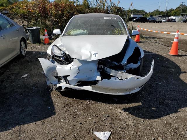 Photo 9 from auction – 2022 TESLA MODEL 3 with VIN 5YJ3E1EB0NF187988