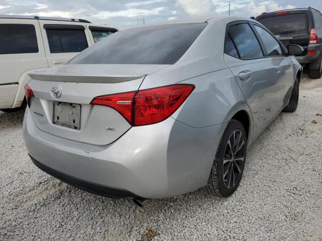 Photo 4 from auction – 2018 TOYOTA COROLLA L with VIN 5YFBURHE1JP830429