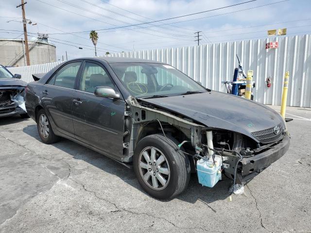 TOYOTA CAMRY LE 2003 with VIN 4T1BE32K43U744297 - Photo from auction