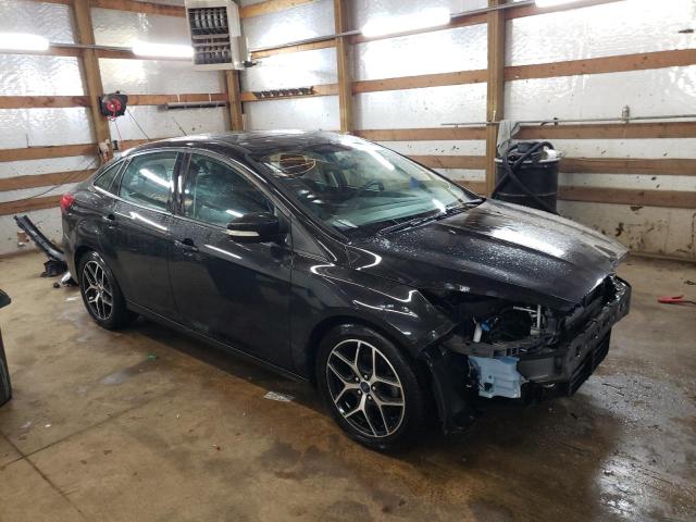 FORD FOCUS SEL 2018 with VIN 1FADP3H25JL320358 - Photo from auction