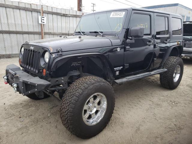 Photo 2 from auction – 2011 JEEP WRANGLER U with VIN 1J4BA3H15BL584735